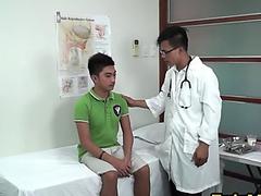 Gay doctor seduces nympho Asian patient in medical room